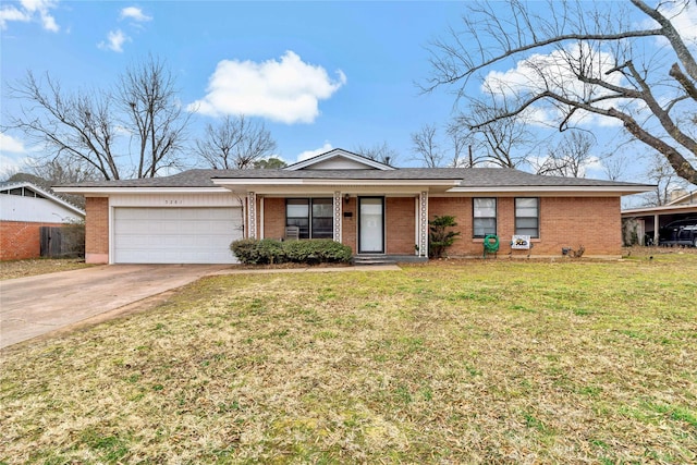 ranch-style home with a garage and a front lawn