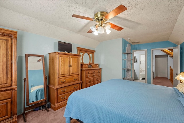 carpeted bedroom featuring lofted ceiling, a textured ceiling, and ceiling fan