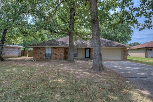 single story home featuring a garage