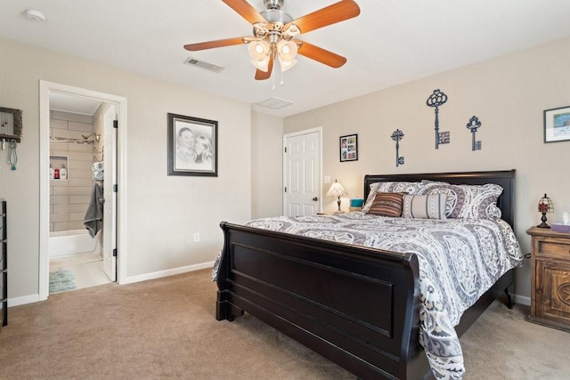 bedroom with connected bathroom, ceiling fan, and carpet