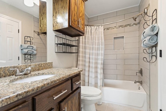 full bathroom with shower / tub combo, vanity, and toilet