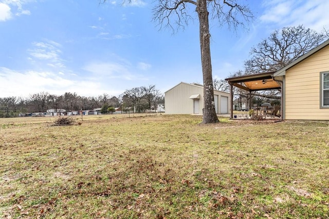 view of yard featuring a garage