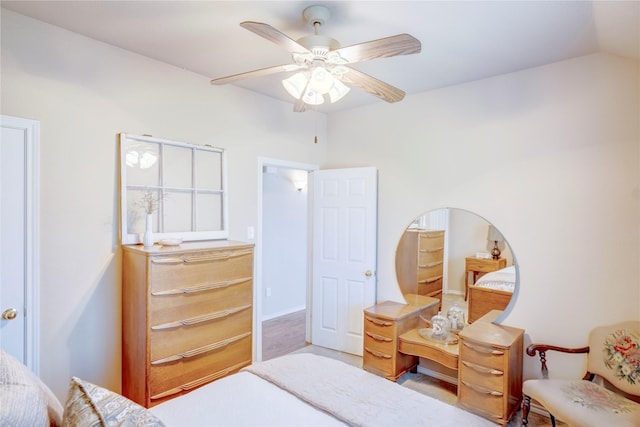 bedroom featuring lofted ceiling and ceiling fan