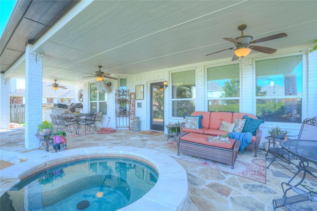 view of swimming pool with a jacuzzi, an outdoor hangout area, a patio, and ceiling fan