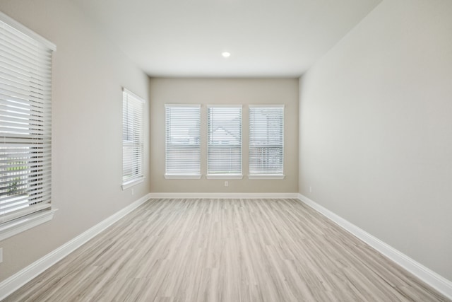 1017 Daisy Way, Crowley, TX 76036 - spare room featuring light wood-style flooring and baseboards