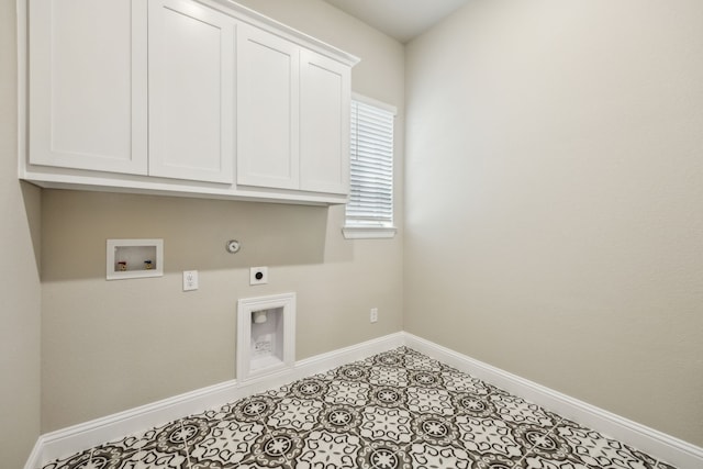 1017 Daisy Way, Crowley, TX 76036 - washroom with hookup for an electric dryer, cabinet space, baseboards, hookup for a washing machine, and hookup for a gas dryer