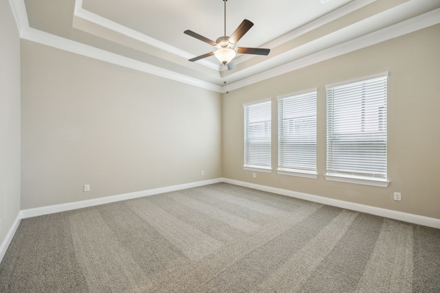 1017 Daisy Way, Crowley, TX 76036 - unfurnished room featuring a tray ceiling, a ceiling fan, carpet floors, crown molding, and baseboards