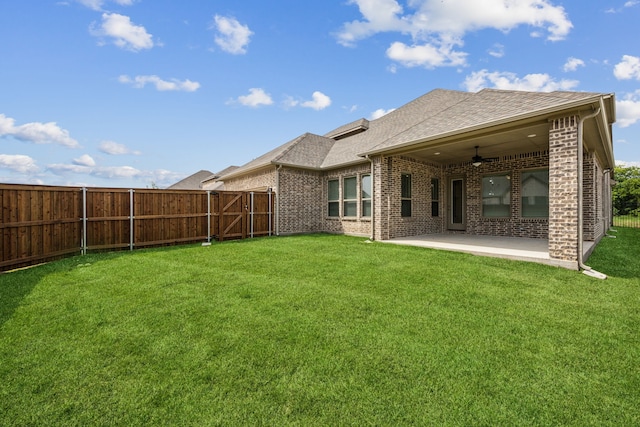 1017 Daisy Way, Crowley, TX 76036 - back of property featuring ceiling fan, a patio, brick siding, and a shingled roof