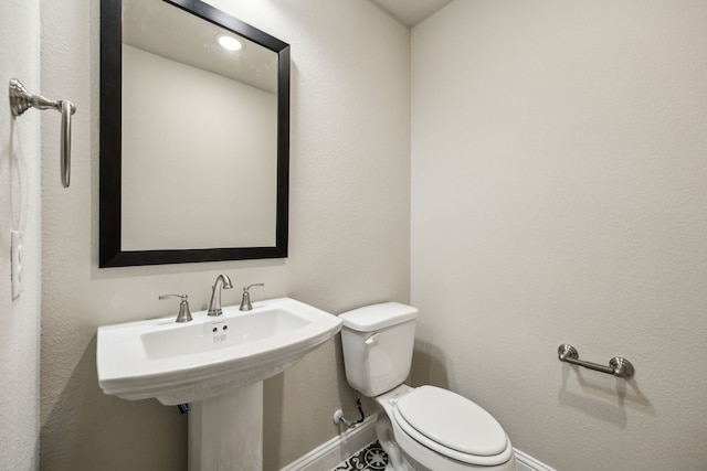 1017 Daisy Way, Crowley, TX 76036 - half bathroom with baseboards and toilet