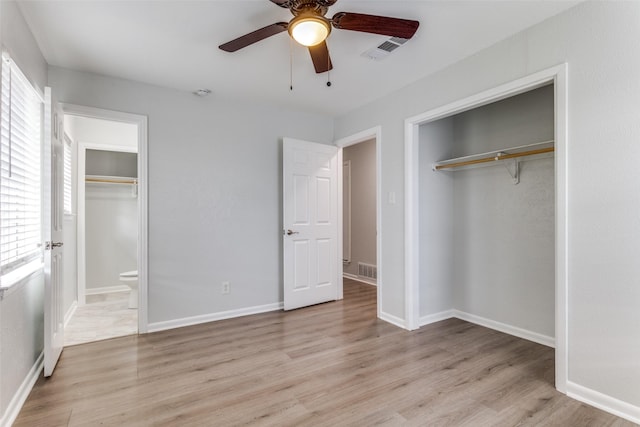 unfurnished bedroom featuring ceiling fan and light wood-type flooring