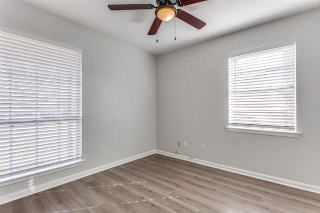 unfurnished room with light hardwood / wood-style floors and ceiling fan