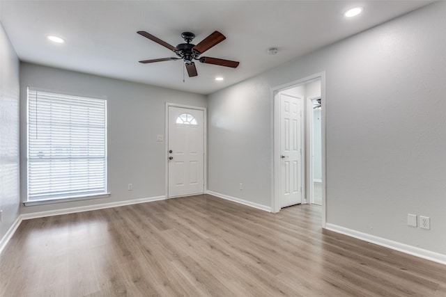 interior space featuring ceiling fan and light hardwood / wood-style flooring