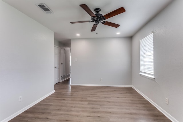 unfurnished room with light hardwood / wood-style floors and ceiling fan