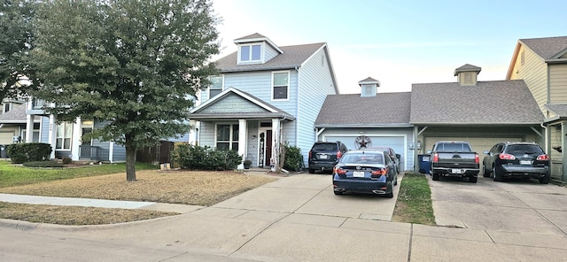 view of front facade featuring a garage and a porch