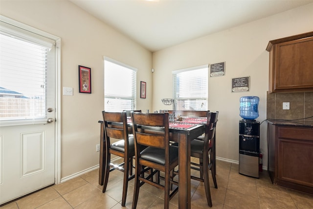 dining room featuring light tile patterned floors