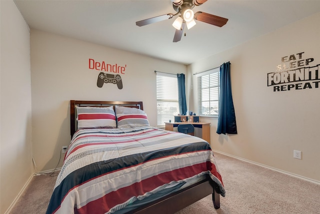 bedroom with ceiling fan and carpet