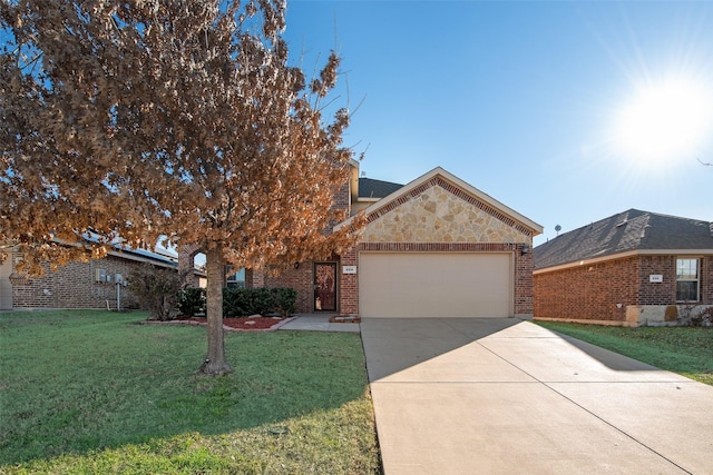 obstructed view of property with a garage and a front yard