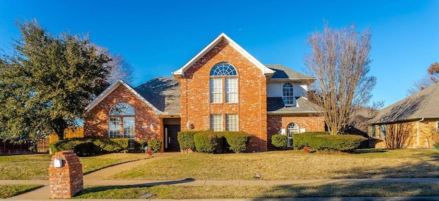 front facade with a front yard