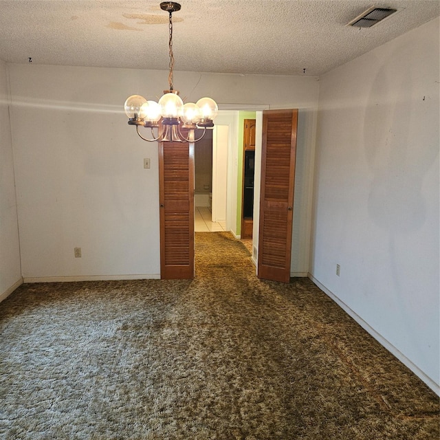 134 Hollie Dr, Red Oak, TX 75154 - unfurnished dining area with a textured ceiling and carpet flooring