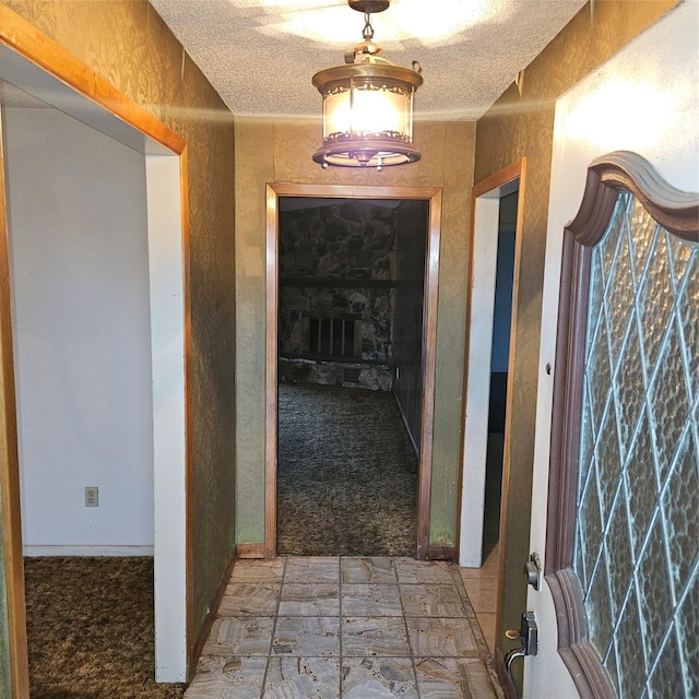 134 Hollie Dr, Red Oak, TX 75154 - hallway featuring a textured ceiling