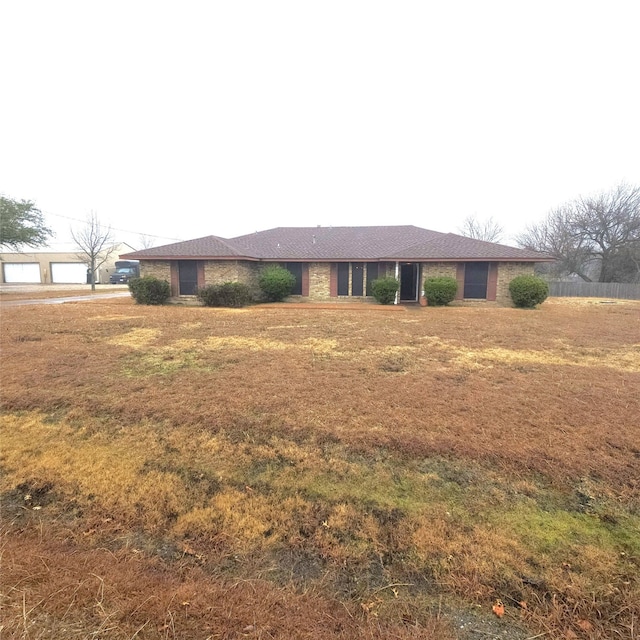 134 Hollie Dr, Red Oak, TX 75154 - single story home with a garage and a front lawn