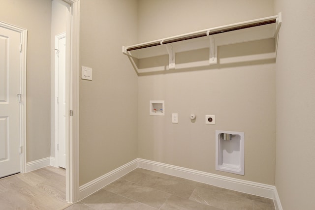 washroom featuring gas dryer hookup, washer hookup, and hookup for an electric dryer