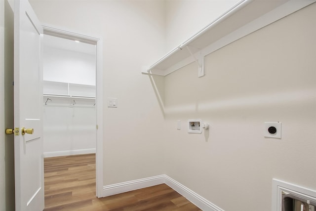 laundry area with washer hookup, hardwood / wood-style flooring, hookup for an electric dryer, and gas dryer hookup