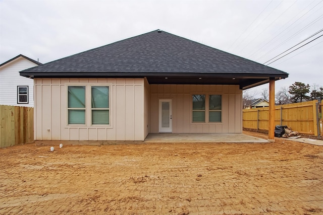 rear view of property featuring a patio area