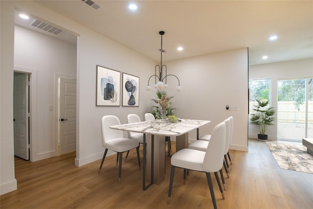 dining room with light wood-type flooring