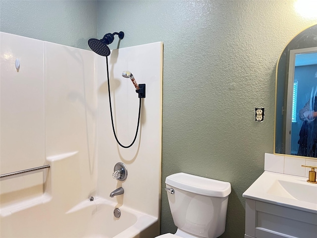 full bathroom with vanity,  shower combination, and toilet