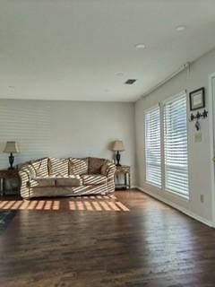 living room featuring dark hardwood / wood-style floors