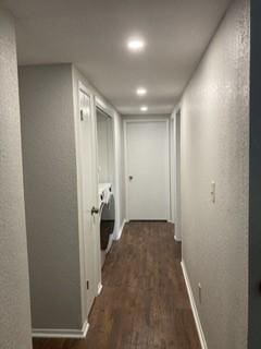 corridor with dark wood-type flooring