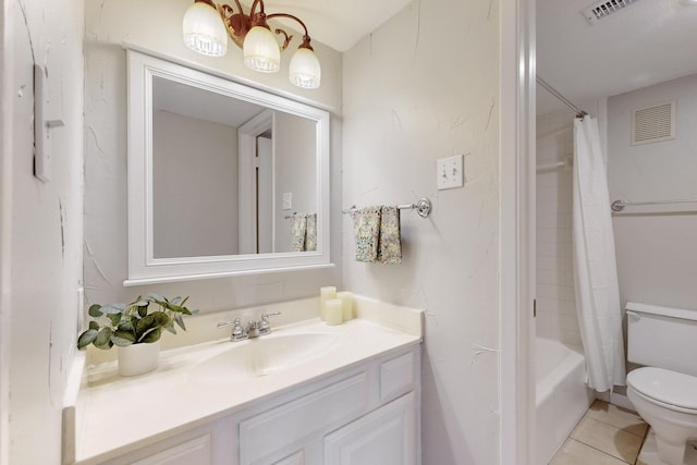 full bathroom featuring shower / bath combination with curtain, tile patterned floors, toilet, and vanity