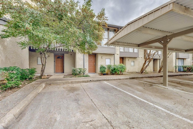 view of car parking with a carport