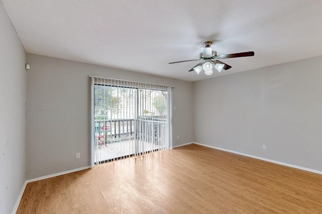 spare room with light hardwood / wood-style floors and ceiling fan