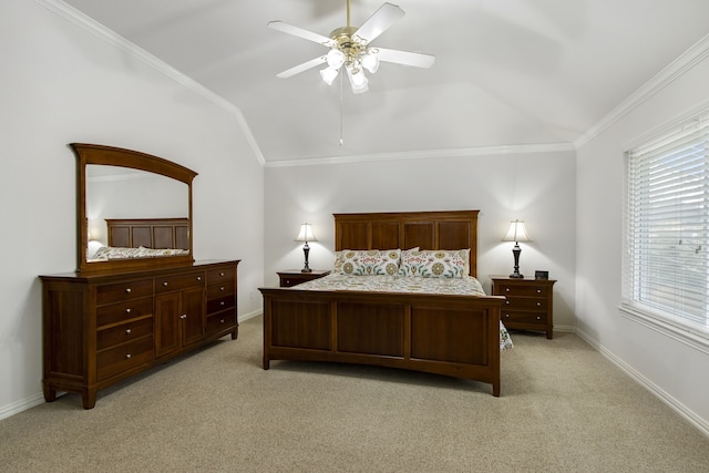 carpeted bedroom featuring crown molding, ceiling fan, vaulted ceiling, and multiple windows