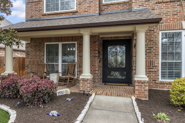 doorway to property featuring a porch