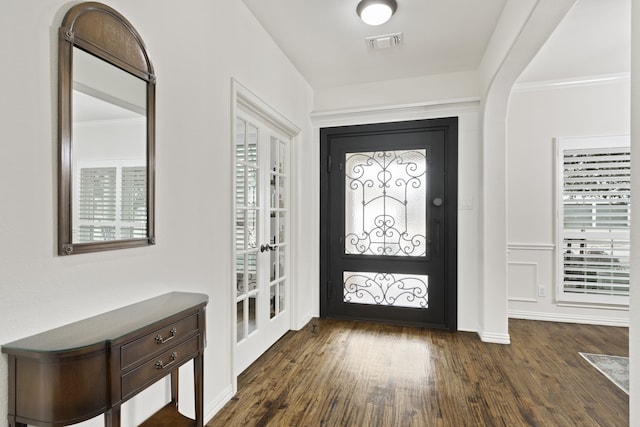 foyer with dark wood-type flooring