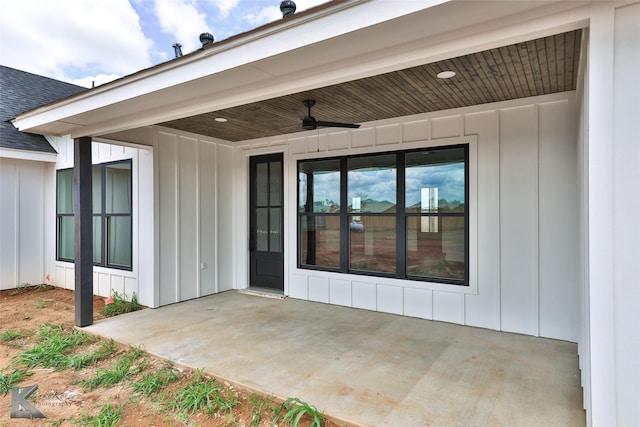 property entrance featuring ceiling fan and a patio area