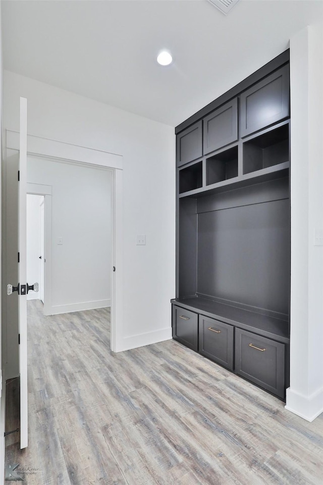 mudroom with light wood-type flooring