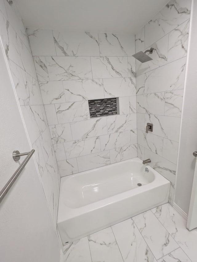 bathroom with shower / bathtub combination