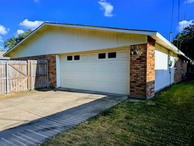 garage featuring a yard