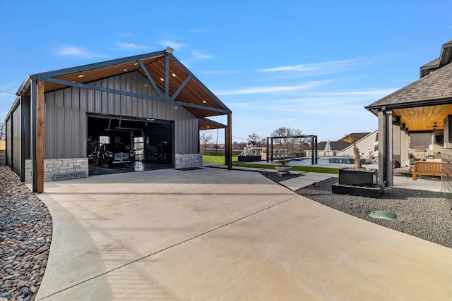 exterior space featuring an outbuilding and a garage