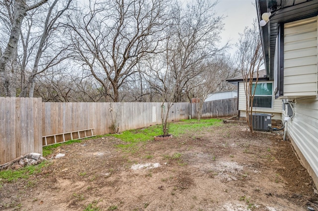 view of yard with central AC