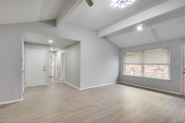 unfurnished room with vaulted ceiling with beams, light hardwood / wood-style floors, and ceiling fan