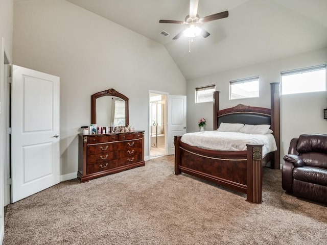 bedroom with visible vents, high vaulted ceiling, ensuite bath, carpet floors, and ceiling fan