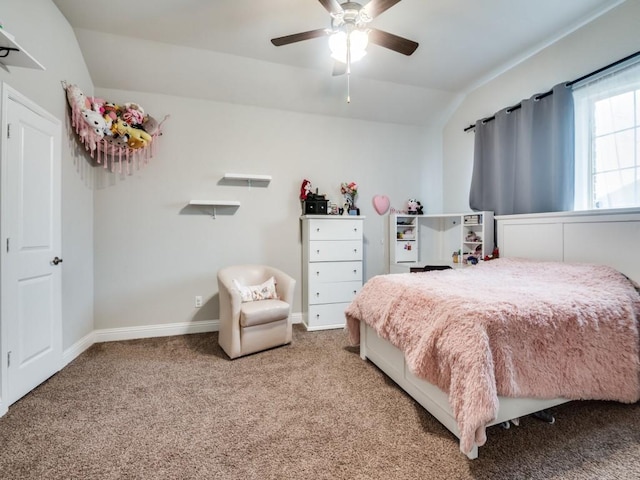 bedroom with lofted ceiling, baseboards, carpet floors, and ceiling fan