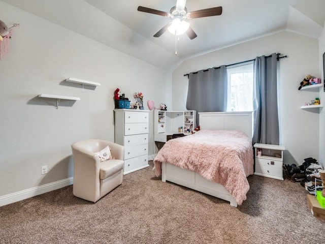 carpeted bedroom featuring lofted ceiling, baseboards, and ceiling fan