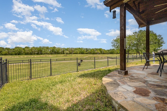528 Highland Ridge Dr, Wylie, TX 75098 - view of yard with a patio area, a fenced backyard, and a rural view