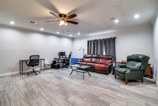 living room with ceiling fan and ornamental molding